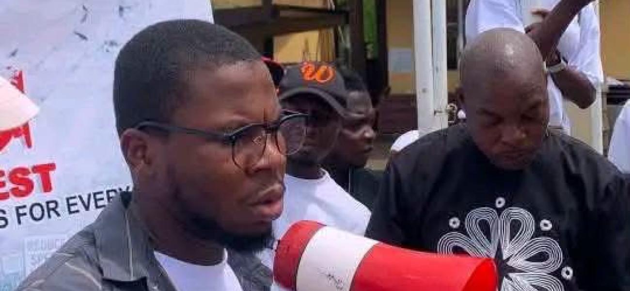 The Youth lead reading the petition to the Bong County Leadership  