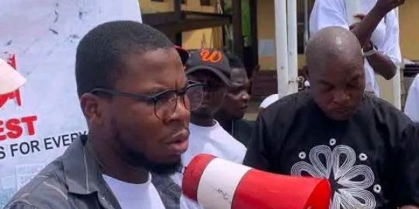 The Youth lead reading the petition to the Bong County Leadership  