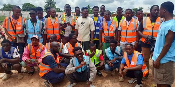 Lawrence Annieway in picture with some motorcyclists who benefited from the donation.